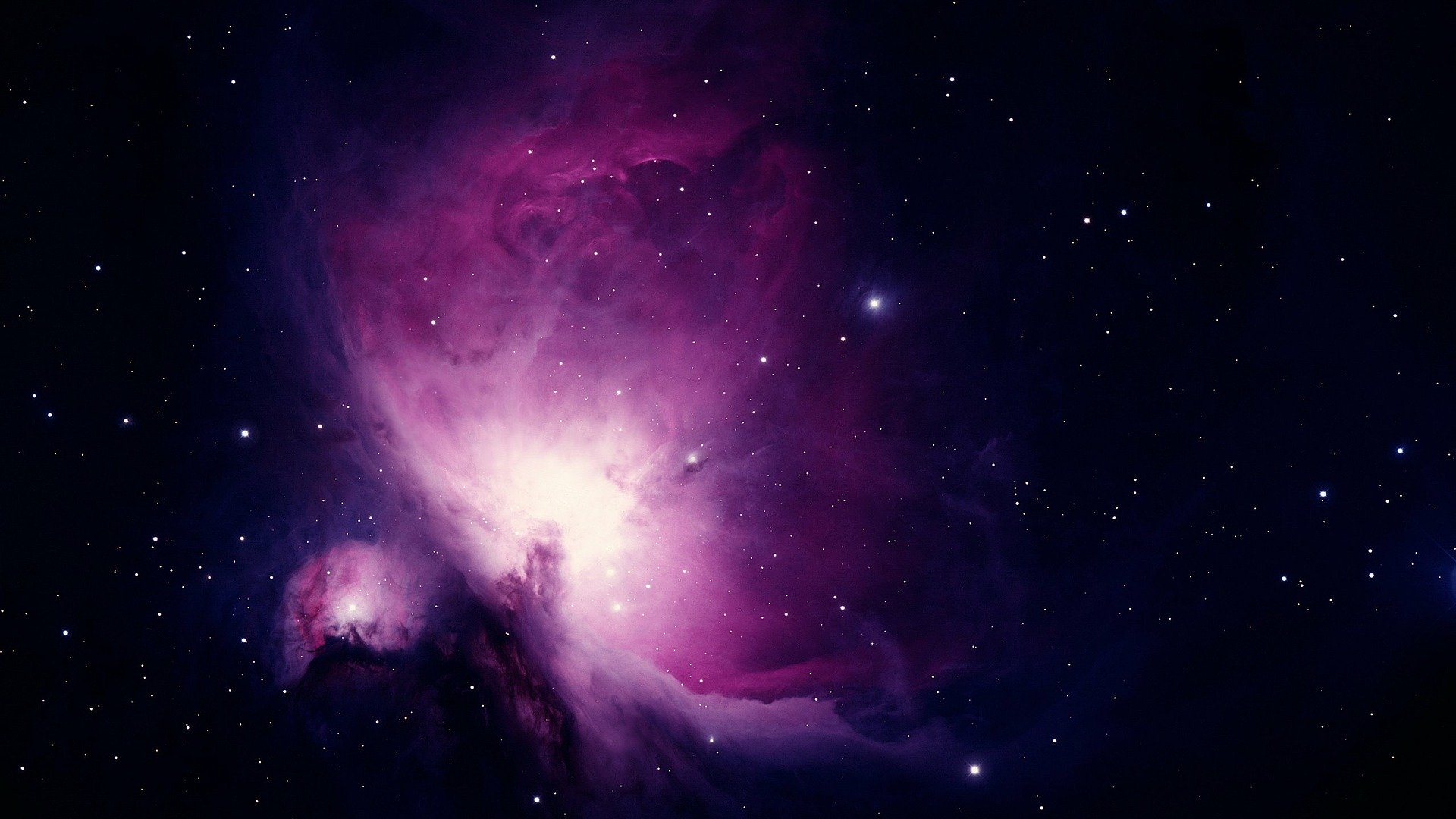 Imagem da Nebulosa de Orion, de cor roxa e rosada